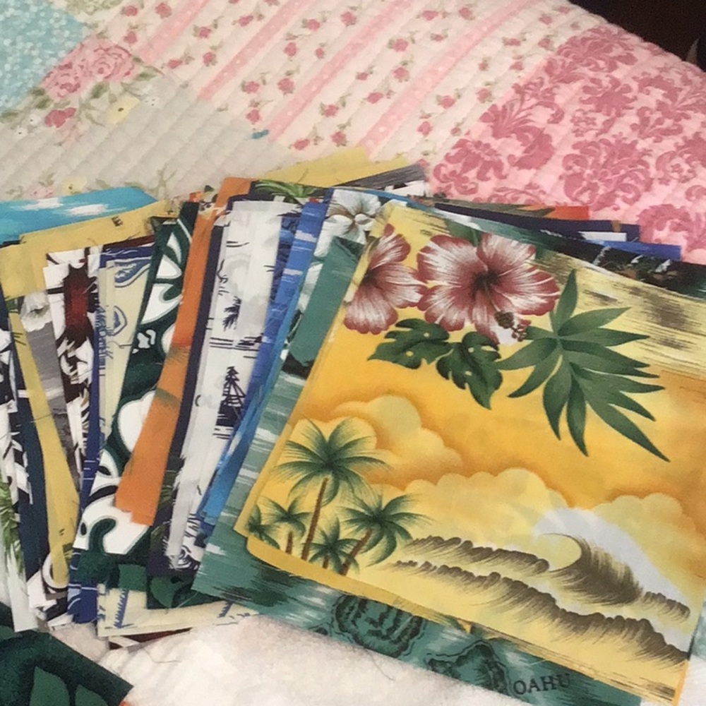 Assorted Hawaiian fabrics squares7x7” these are included quantities vari